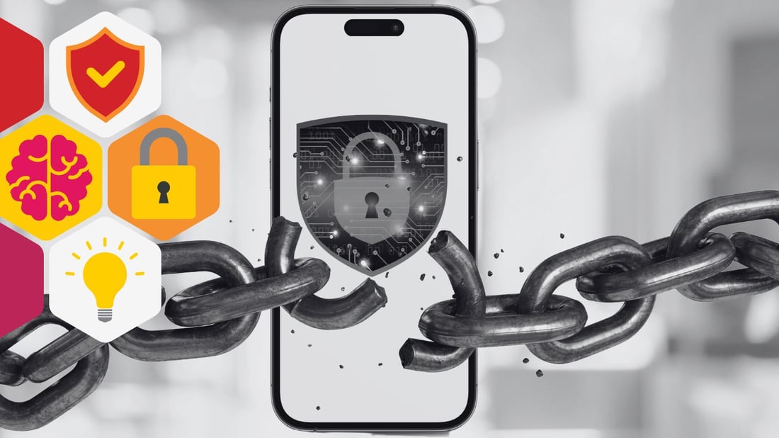 a chain breaks in front a cellphone, on the cellphone screen is an image of a padlock on a shield 