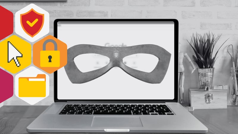 computer wearing a superhero mask
