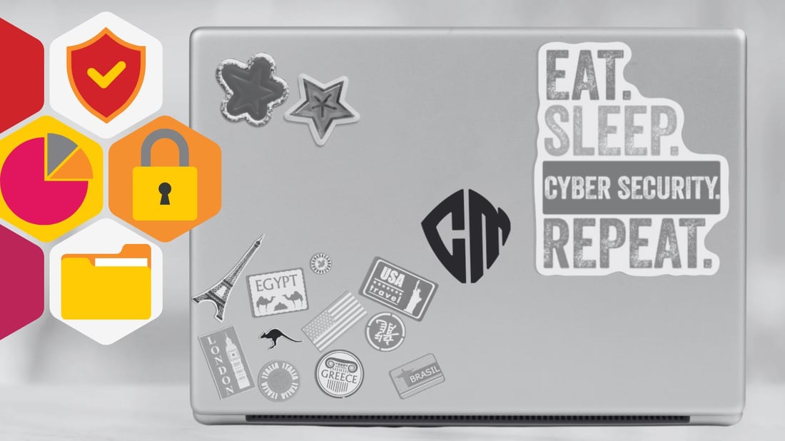  back of a laptop covered with cybersecurity stickers