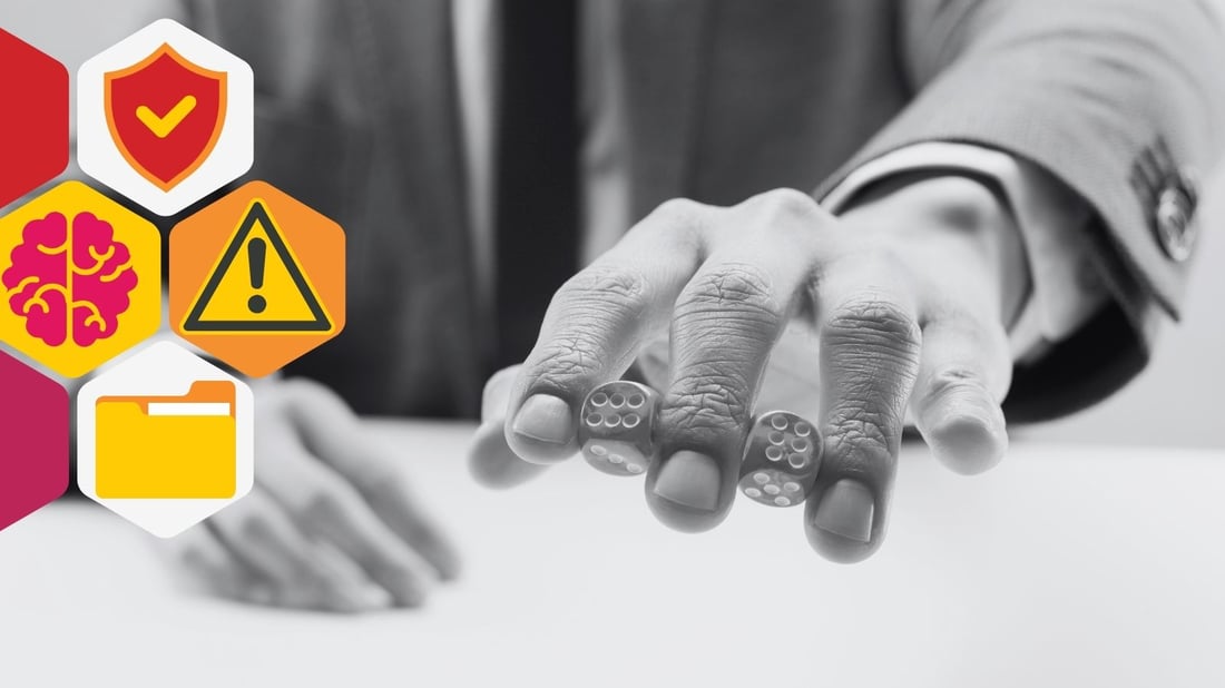 Blog header showing a man in a suit holding two dice between his fingers.